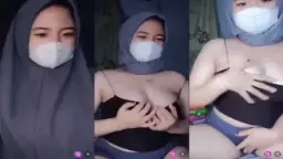 Gadis Muda Berjilbab Bermasker Remas Payudara